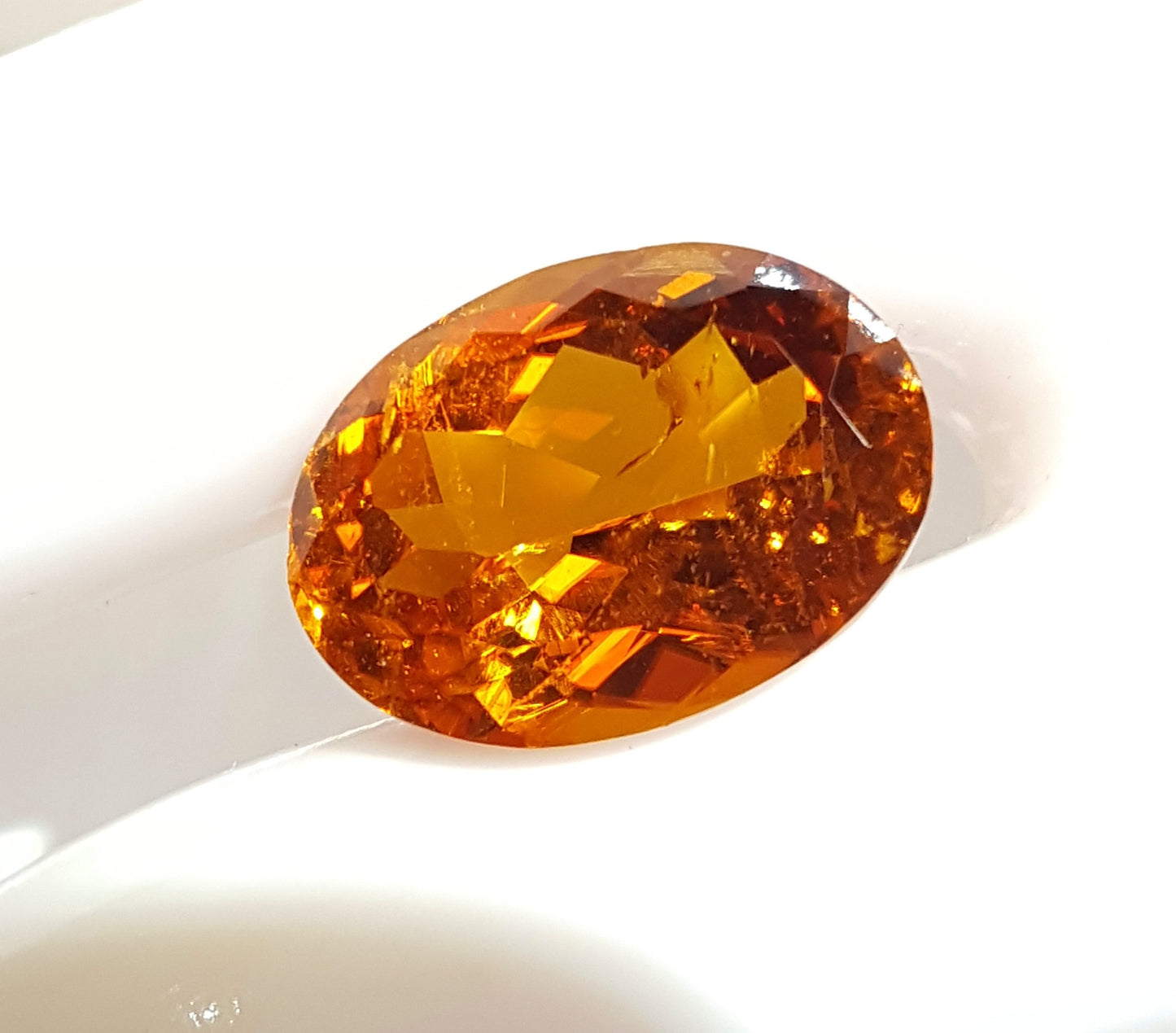 Rare Large 11.5 Carat Natural Clinohumite Oval Cut Collector's Gem Stone